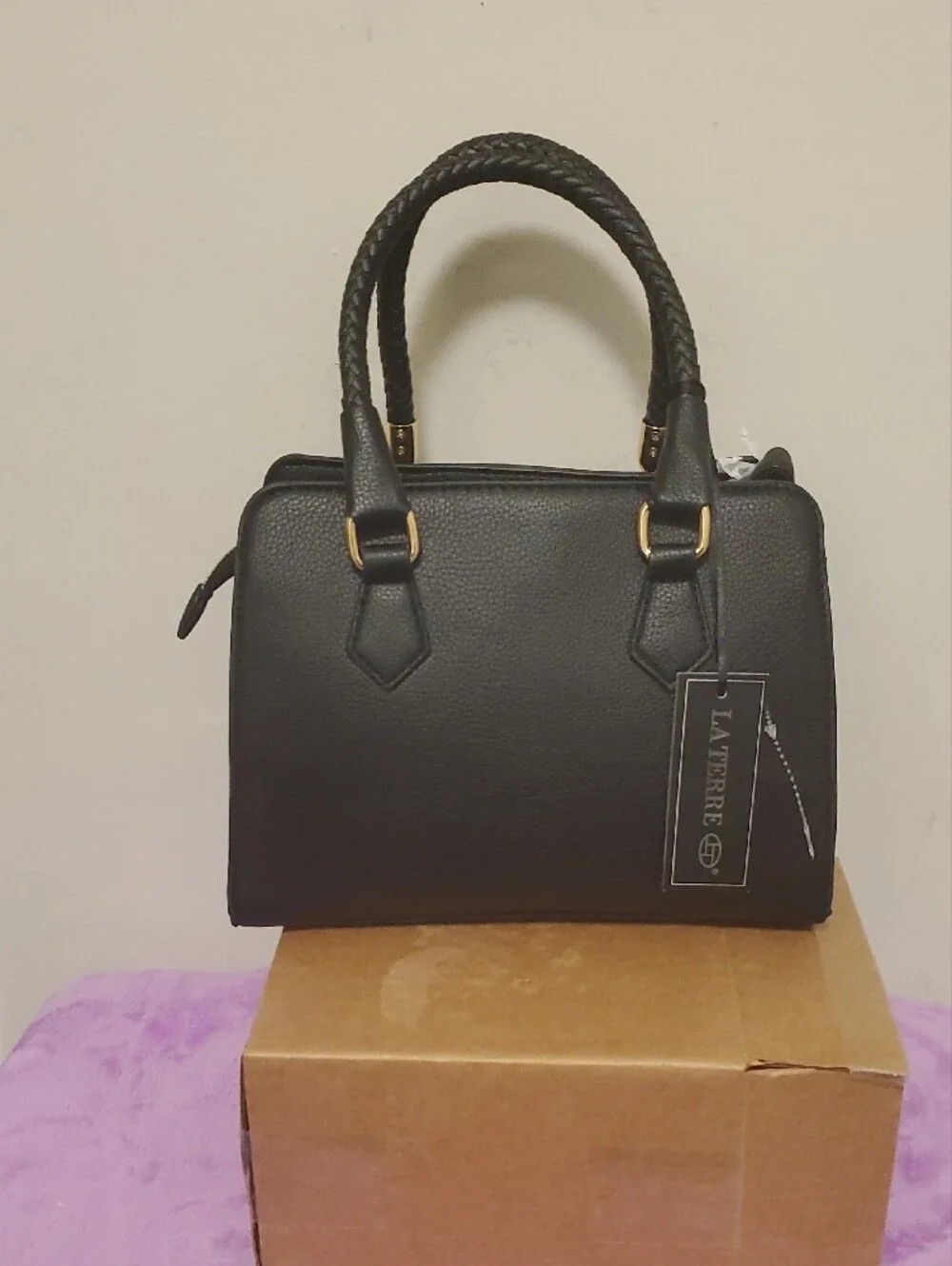 Structured Black Satchel with Braided Handles and Gold Accents